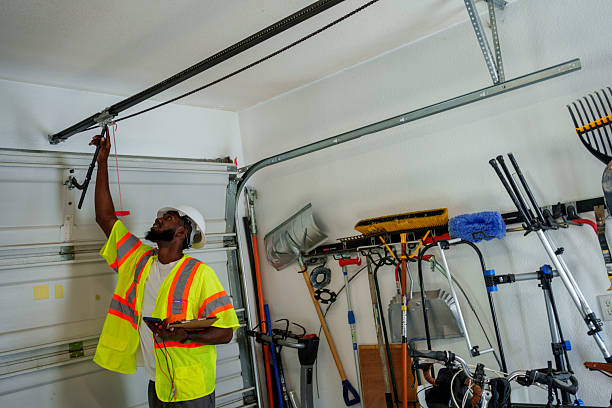 Professional Garage Door Panel Replacement technician working in Clinton, OH